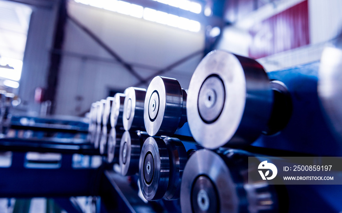 Metal sheet forming machine at the modern metalwork factory.