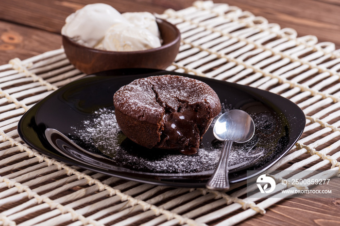 Mouth watering delicious chocolate fondant cake, restaurant serving.