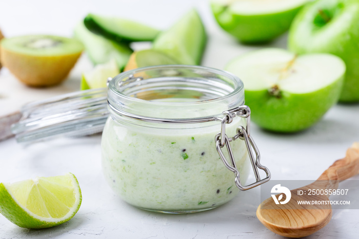 Healthy yoghurt drinks with fresh vegetables and fruits in glass jar