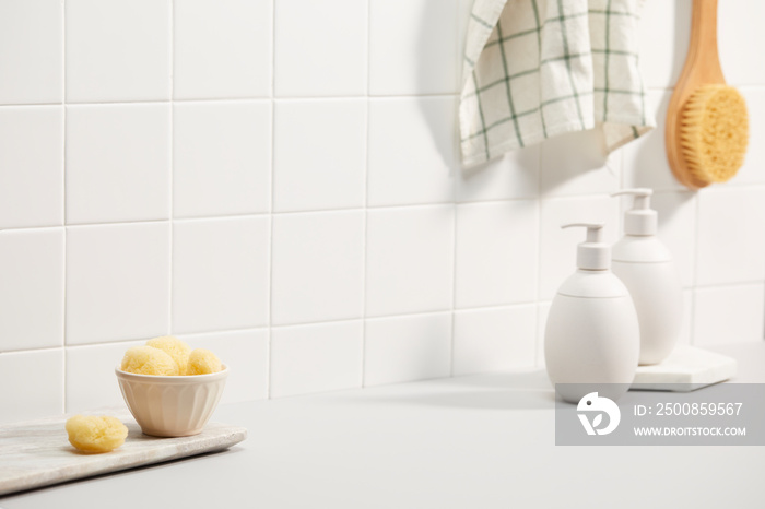 bathroom with white tile wall and bath objects. space for text, copy space