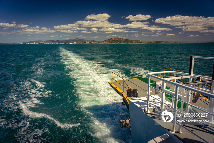 Ferry sailing away from the shores of Townsville, Queensland, Australia