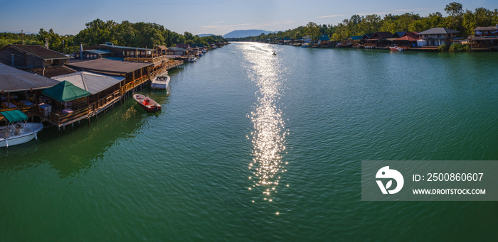 Bojana river delta and Ada Island in Ulcinj, Montenegro. - It is a popular tourist destination with long sandy beach and traditional seafood restaurants. People and signs unrecognizable.