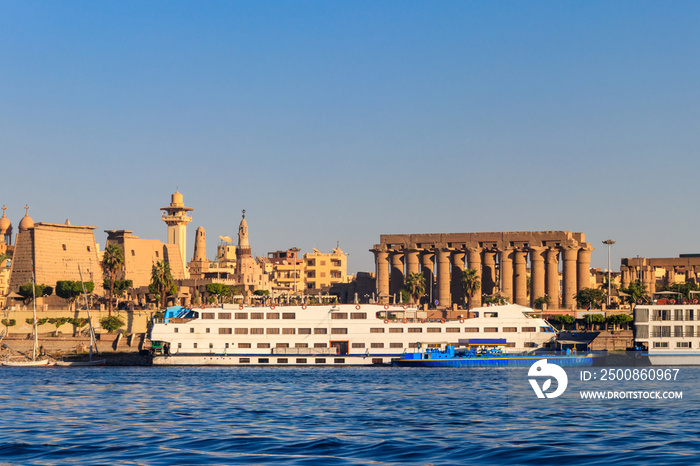 Luxor Temple is a large Ancient Egyptian temple complex on east bank of Nile river in Luxor (ancient Thebes). View from Nile river