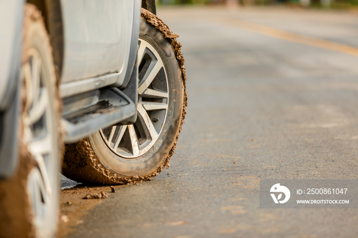 Wheel of SUV car with dirty from clay