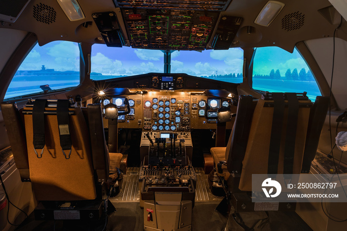 A view of the cockpit of a large commercial airplane, a cockpit trainer.