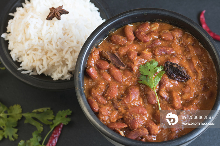 Rājma or Razma is a popular vegetarian dish, originating from the Indian subcontinent, consisting of red kidney beans in a thick gravy