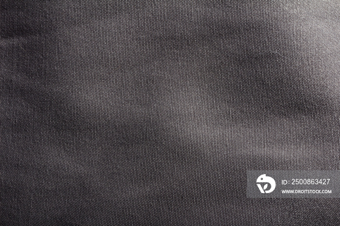 Texture close-up photo of dark grey cloth material.