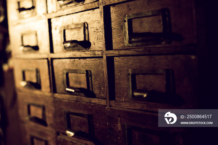 Old wooden wardrobe with small drawers for storing letters, vintage retro-safe, exclusive 19th century handmade mini-wardrobe