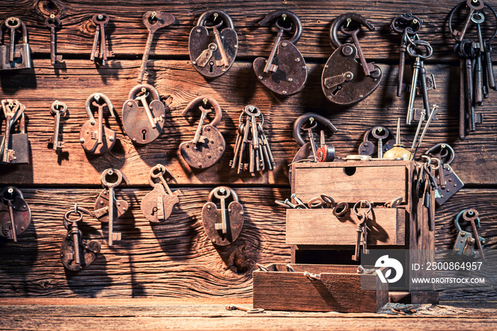 Locksmiths workshop with locks and tools. Forgotten locksmiths workplace.