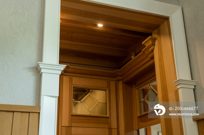 wooden trim of the door frame in the interior, interior element close-up