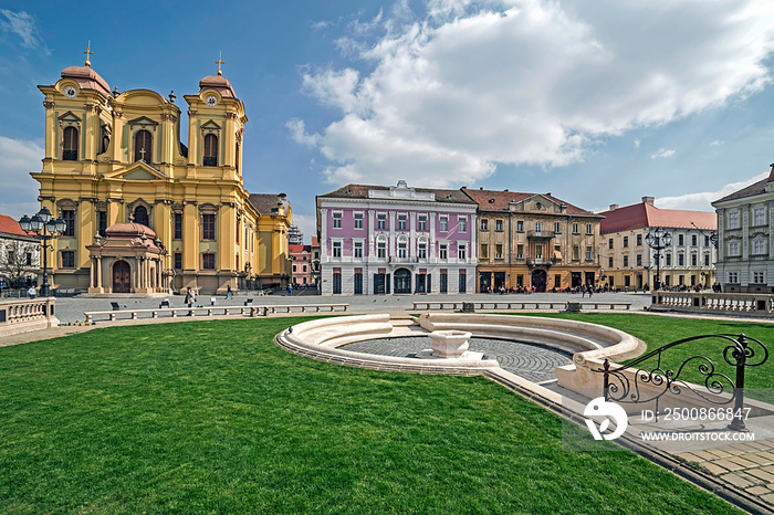 View of one part at Union Square in Timisoara, Romania, with old buildings and mineral fountain