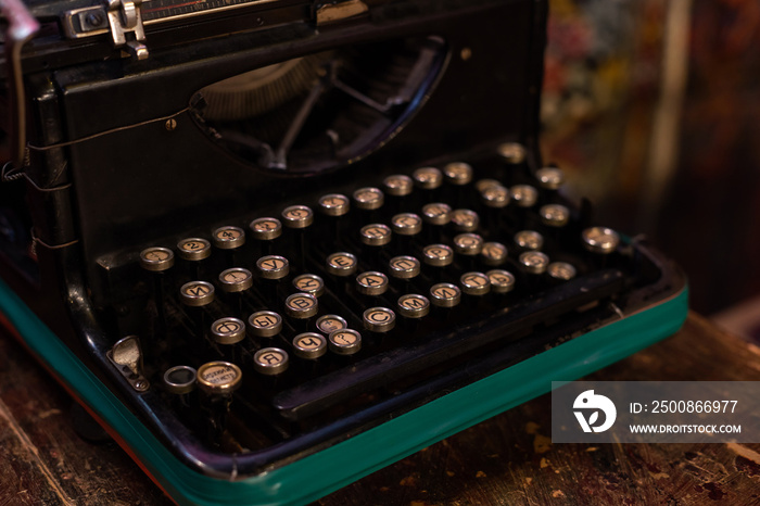 Antique Typewriter. Vintage Typewriter Machine Closeup Photo.