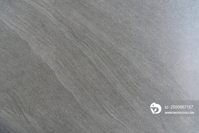 Close up of polished concrete benchtop, counter top with grey gray scale patterned texture in house, home decor ideas.