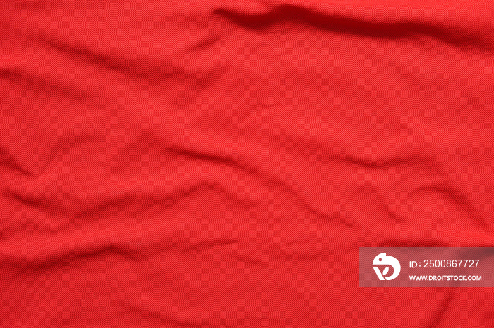 Surface of blank red clothes, texture  of red cotton waves for background.