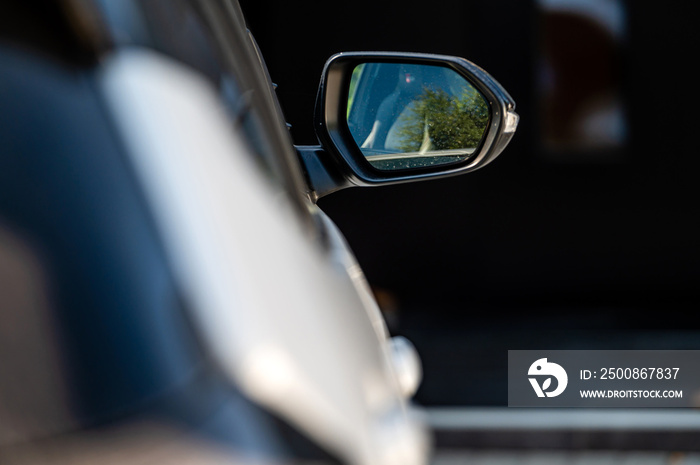 side rear view mirror on a modern car, closeup