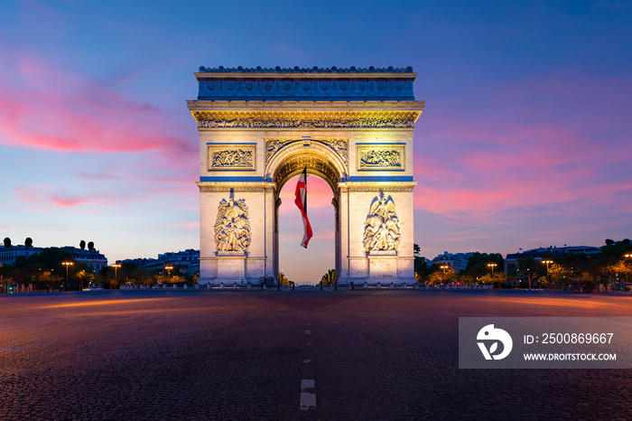 Arc de Triomphe de Paris at night in Paris, France.