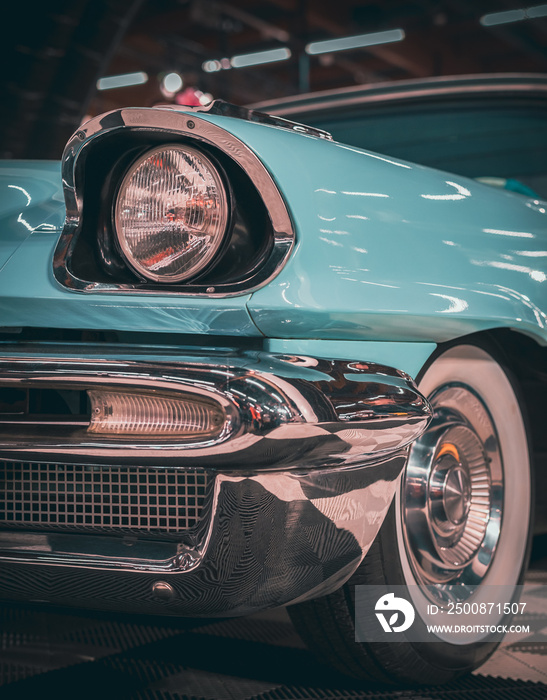 Classic car headlights close-up. The concept of a poster on the wall