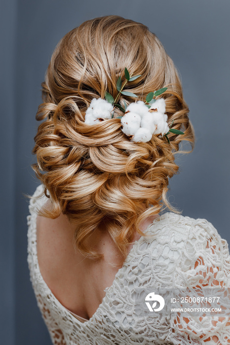 beauty wedding hairstyle decorated with cotton flower, rear view