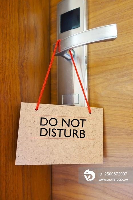 Do not disturb sign on handle at the hotel