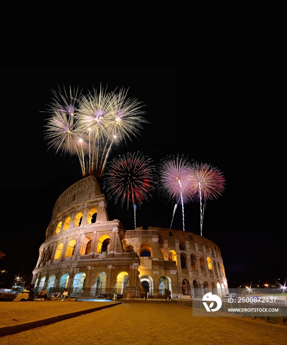 Colosseum illuminated with fireworks in Rome.