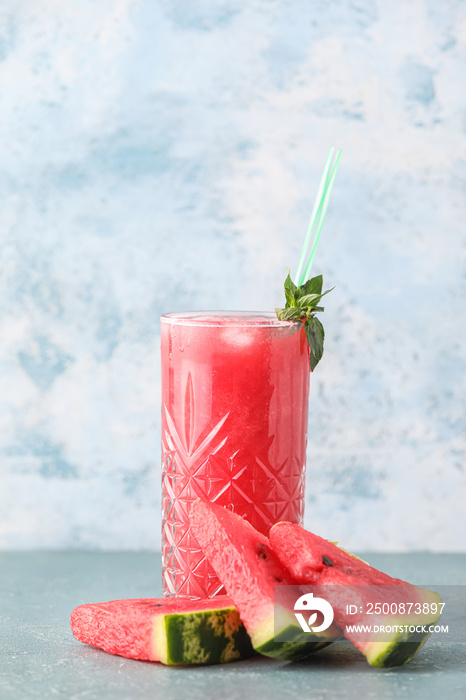 Glass with delicious cold watermelon fresh on color background