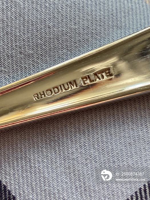 rhodium plate stamped on 1940s cutlery handle rhodium first used in 1930s for cutlery sets, rhodium is used in plating jewellery still