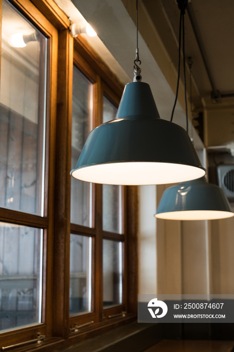 lamps on the ceiling at coffee shop