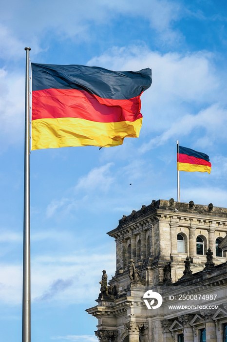 Reichstag building architecture and German Flags in Berlin