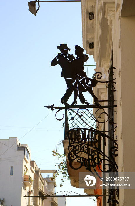 Impressive tango dancing couple shaped signboard in downtown Buenos Aires, Argentina