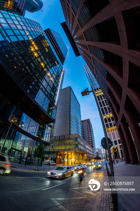 city traffic under the skyscrapers in the city, fisheye lens