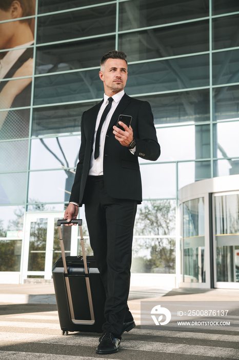 Concentrated businessman dressed in suit