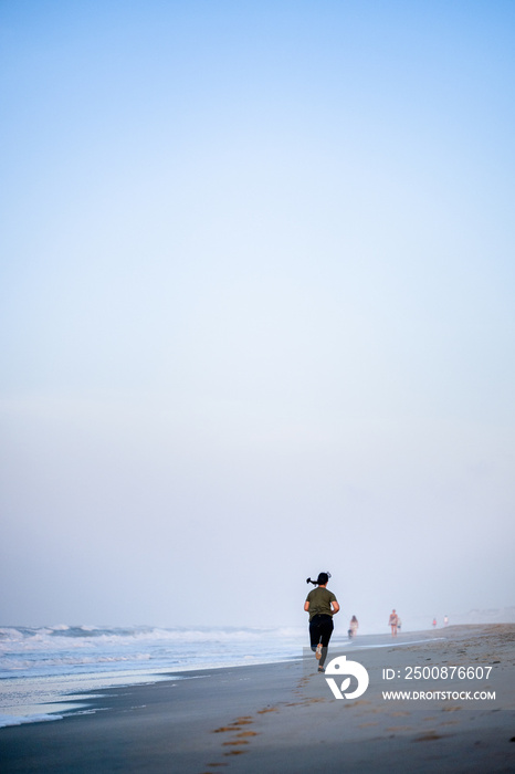 Marine veteran trains every morning on the beach to stay in shape just like when she was on active duty.