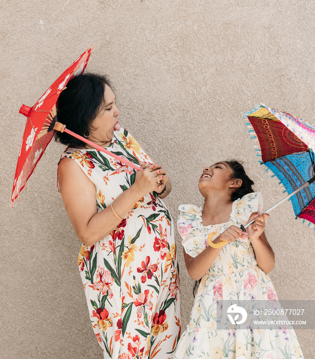 South Asian grandparent and granddaughter together