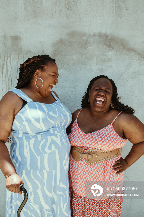 2 African American women laughing