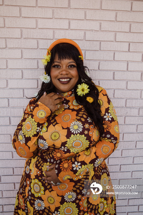 portrait of a plus size Black woman outside smiling