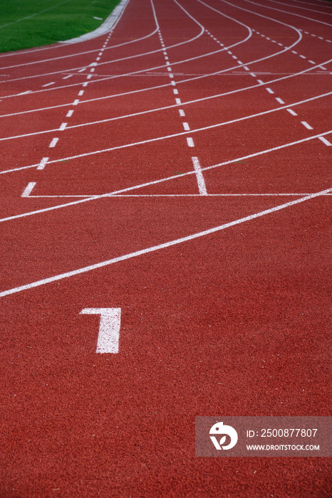 Red running track in sport stadium