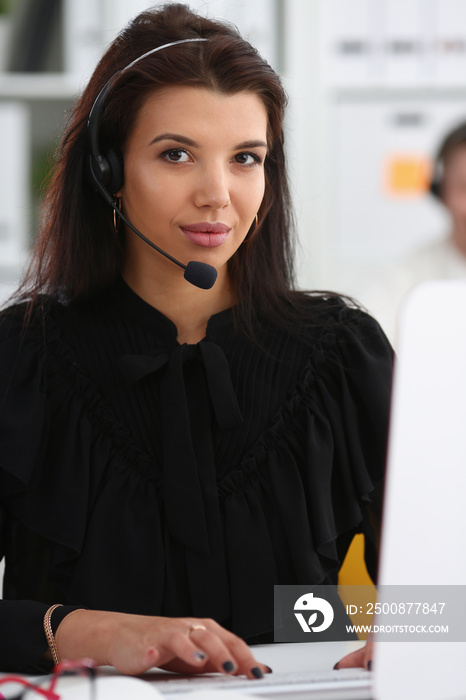 Three call centre service operators at work