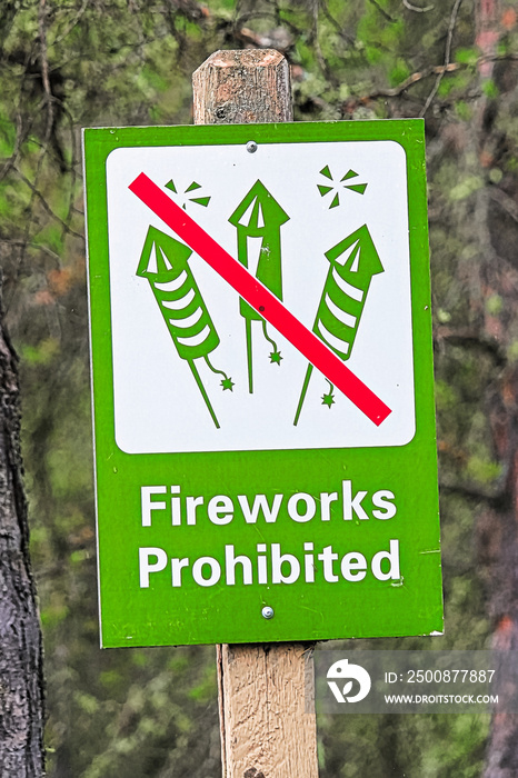 Closeup of a green fireworks prohibited sign