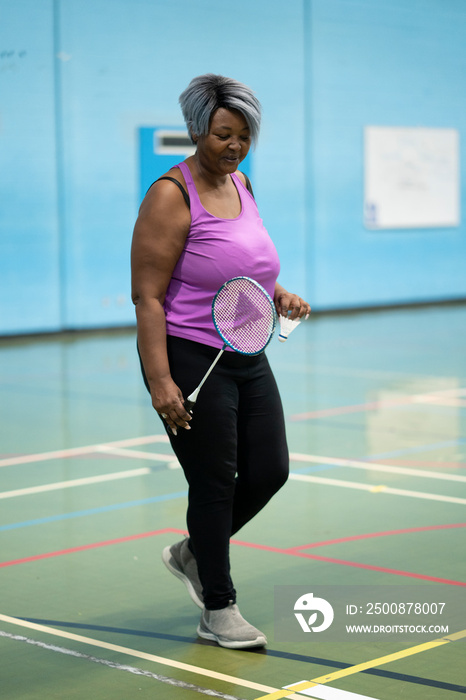 Woman playing badminton