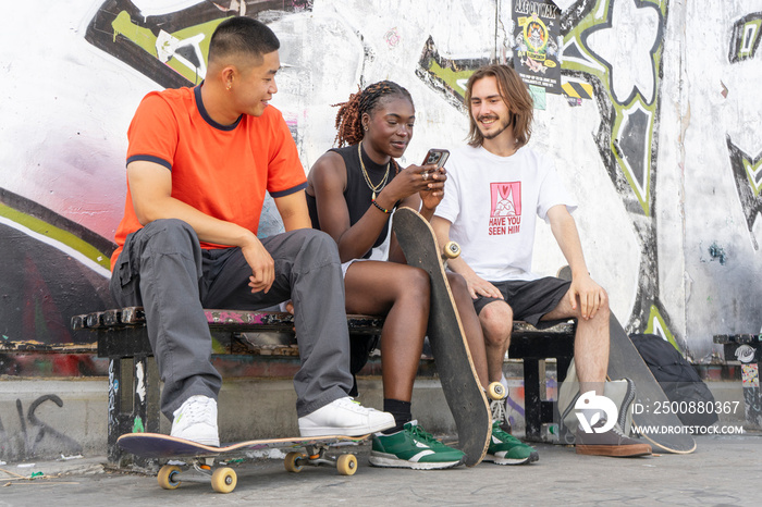 Group of young friends with skateboards