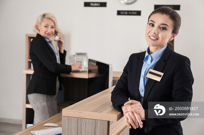 Female hotel receptionist at workplace