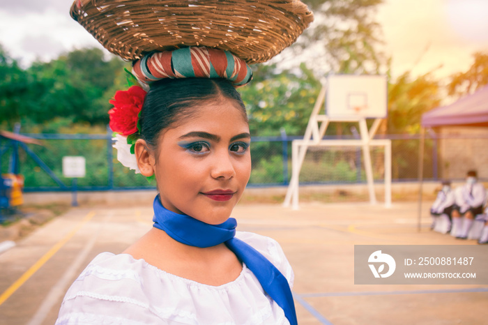 Teenager looking at the camera wearing the traditional costume of Central America, Nicaragua, Costa Rica, Honduras, El Salvador, Guatemala, Panama and other Latin American and South America countries.