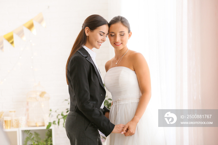 Beautiful lesbian couple during wedding ceremony