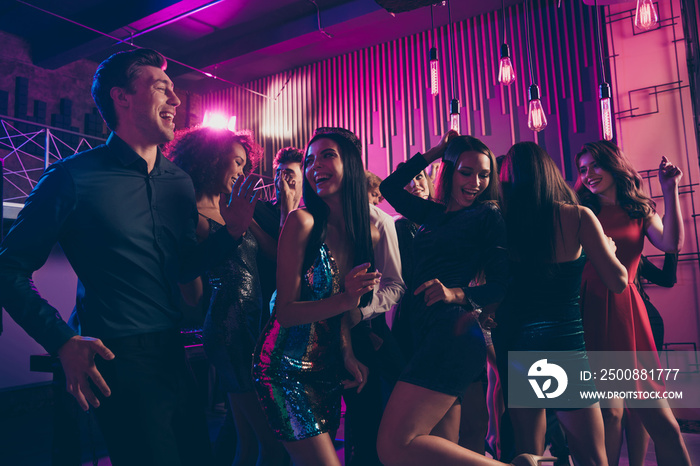 Photo portrait of guys and girl dancing together at nightclub laughing chilling having good mood