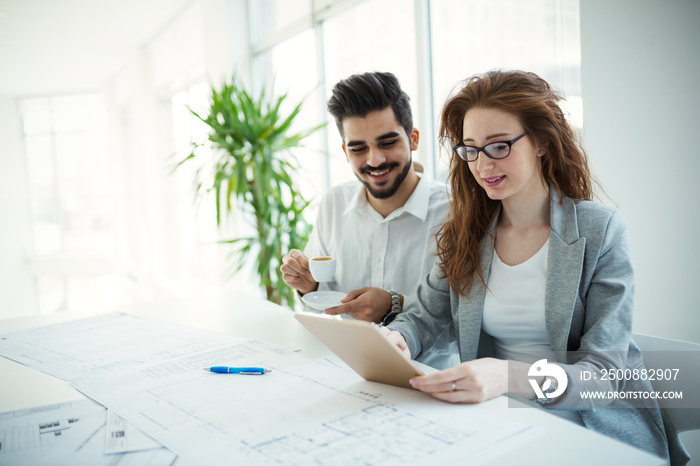 Business people working together on project and brainstorming in office