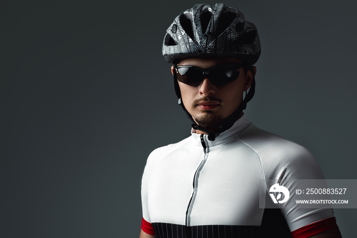 portrait of cyclist wearing helmet