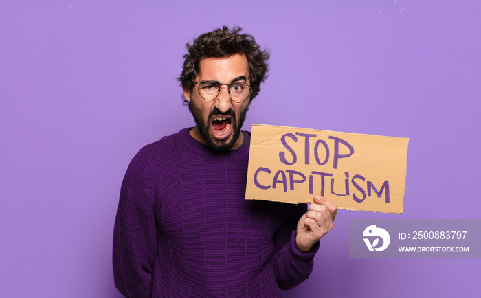 young bearded man stop capitalism concept