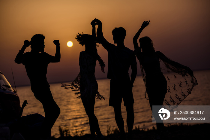 Photo of cheerful charming buddies company enjoying sundown having fun together outdoors countryside forest