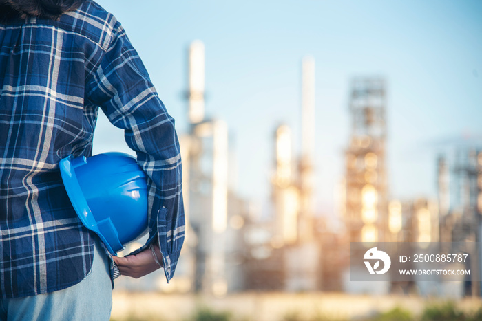 Electrician Technical operator worker hardhat blue work helmet Engineering. engineer woman hand holding Blue hard hat. Electrician woman worker oil petro industry safety at work blue worker helmet.