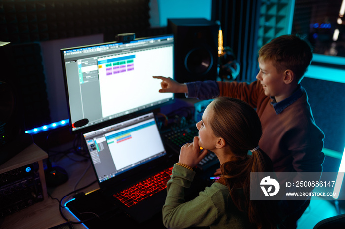 Overhead view on children musician mixing soundtrack